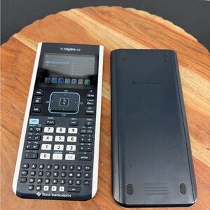 Texas Instruments TI-Nspire CX Graphing Calculator with Charger cord